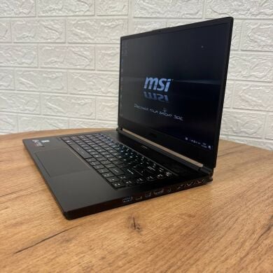 Игровой ноутбук Б-класс MSI GS65 Stealth 9SG / 15.6" (1920x1080) IPS / Intel Core i7-9750H (6 (12) ядра по 2.6&nbsp;- 4.5&nbsp;GHz) / 16 GB DDR4 / 512 GB SSD / nVidia GeForce RTX 2080 Max-Q, 8 GB GDDR6, 256-bit / WebCam