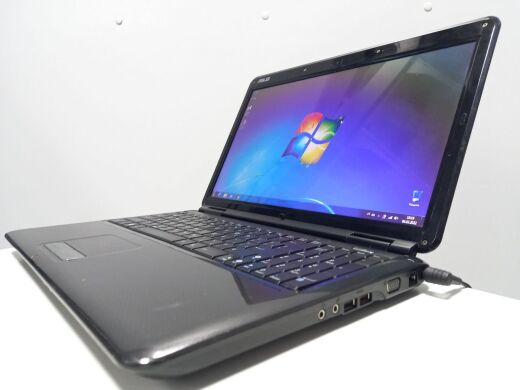 Ноутбук Asus K50IJ / 15.6" (1366x768) TN / Intel Celeron T3100 (2 ядра по 1.9 GHz) / 4 GB DDR2 / 250 GB HDD / Intel GMA 4500M HD Graphics / WebCam / АКБ не держит Ноутбук Asus K50IJ / 15.6" (1366x768) TN / Intel Celeron T3100 (2 ядра по 1.9 GHz) / 4 GB DDR2 / 250 GB HDD / Intel GMA 4500M HD Graphics / WebCam / АКБ не держит