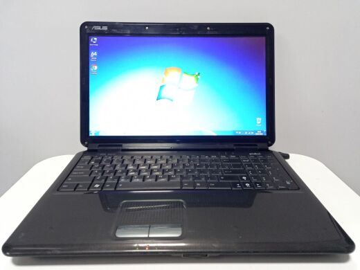 Ноутбук Asus K50IJ / 15.6" (1366x768) TN / Intel Celeron T3100 (2 ядра по 1.9 GHz) / 4 GB DDR2 / 250 GB HDD / Intel GMA 4500M HD Graphics / WebCam / АКБ не держит Ноутбук Asus K50IJ / 15.6" (1366x768) TN / Intel Celeron T3100 (2 ядра по 1.9 GHz) / 4 GB DDR2 / 250 GB HDD / Intel GMA 4500M HD Graphics / WebCam / АКБ не держит