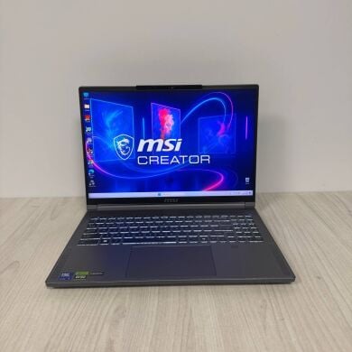 Игровой ноутбук Б-класс MSI Creator 16 AI Studio A1VHG / 16" (3840x2400) IPS / Intel Core Ultra 9 185H (16 (22) ядер по 3.9 - 5.1 GHz) / 32 GB DDR5 / 1000 GB SSD NVMe / nVidia GeForce RTX 4080, 12 GB GDDR6, 192-bit / WebCam Игровой ноутбук Б-класс MSI Creator 16 AI Studio A1VHG / 16" (3840x2400) IPS / Intel Core Ultra 9 185H (16 (22) ядер по 3.9 - 5.1 GHz) / 32 GB DDR5 / 1000 GB SSD NVMe / nVidia GeForce RTX 4080, 12 GB GDDR6, 192-bit / WebCam