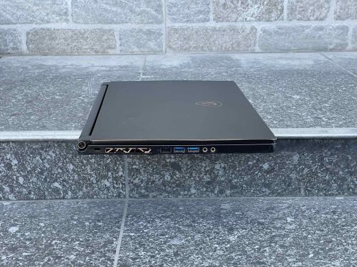 Игровой ноутбук MSI GS65 8RF Stealth Thin / 15.6" (1920x1080) IPS / Intel Core i7-8750H (6 (12) ядра по 2.2 - 4.1 GHz) / 32 GB DDR4 / 512 GB SSD / nVidia GeForce GTX 1070 Max-Q, 8 GB GDDR5, 256-bit / WebCam / Win10 Home