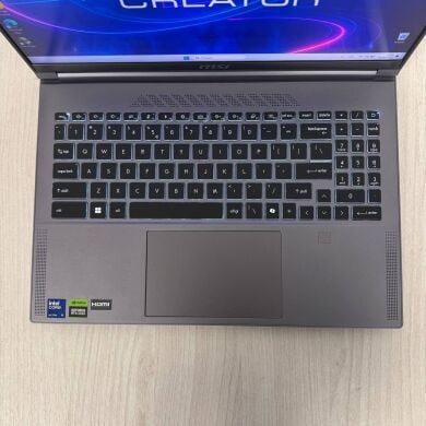 Игровой ноутбук Б-класс MSI Creator 16 AI Studio A1VHG / 16" (3840x2400) IPS / Intel Core Ultra 9 185H (16 (22) ядер по 3.9 - 5.1 GHz) / 32 GB DDR5 / 1000 GB SSD NVMe / nVidia GeForce RTX 4080, 12 GB GDDR6, 192-bit / WebCam Игровой ноутбук Б-класс MSI Creator 16 AI Studio A1VHG / 16" (3840x2400) IPS / Intel Core Ultra 9 185H (16 (22) ядер по 3.9 - 5.1 GHz) / 32 GB DDR5 / 1000 GB SSD NVMe / nVidia GeForce RTX 4080, 12 GB GDDR6, 192-bit / WebCam