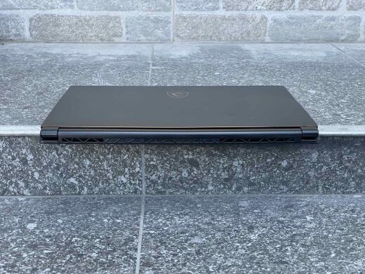 Игровой ноутбук MSI GS65 8RF Stealth Thin / 15.6" (1920x1080) IPS / Intel Core i7-8750H (6 (12) ядра по 2.2 - 4.1 GHz) / 32 GB DDR4 / 512 GB SSD / nVidia GeForce GTX 1070 Max-Q, 8 GB GDDR5, 256-bit / WebCam / Win10 Home