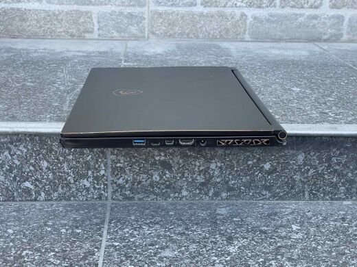 Игровой ноутбук MSI GS65 8RF Stealth Thin / 15.6" (1920x1080) IPS / Intel Core i7-8750H (6 (12) ядра по 2.2 - 4.1 GHz) / 32 GB DDR4 / 512 GB SSD / nVidia GeForce GTX 1070 Max-Q, 8 GB GDDR5, 256-bit / WebCam / Win10 Home
