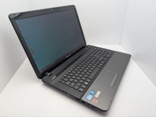 Ноутбук Packard Bell LS11HR / 17.3" (1600x900) TN / Intel Core i5-2430M (2 (4) ядра по 2.4 - 3.0 GHz) / 8 GB DDR3 / 120 GB SSD + 500 GB HDD / AMD Radeon HD 6550M, 1 GB GDDR3, 128-bit / WebCam / DVD-ROM