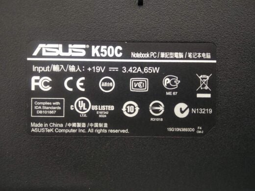 Ноутбук клас Б Asus K50C / 15.6" (1366x768) TN / Intel Celeron 220 (1 ядра по 1.2 GHz) / 2 GB DDR2 / 80 GB HDD / SIS Mirage 3+ 672MX / WebCam / DVD-RW / АКБ не тримає