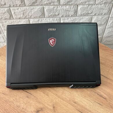 Игровой ноутбук MSI GE72MVR 7RG Apache Pro / 17.3" (1920x1080) IPS / Intel Core i7-7700HQ (4 (8) ядра по 2.8 - 3.8 GHz) / 16 GB DDR4 / 128 GB SSD + 1000 GB HDD / nVidia GeForce GTX 1070, 8 GB GDDR5, 256-bit / WebCam Игровой ноутбук MSI GE72MVR 7RG Apache Pro / 17.3" (1920x1080) IPS / Intel Core i7-7700HQ (4 (8) ядра по 2.8 - 3.8 GHz) / 16 GB DDR4 / 128 GB SSD + 1000 GB HDD / nVidia GeForce GTX 1070, 8 GB GDDR5, 256-bit / WebCam
