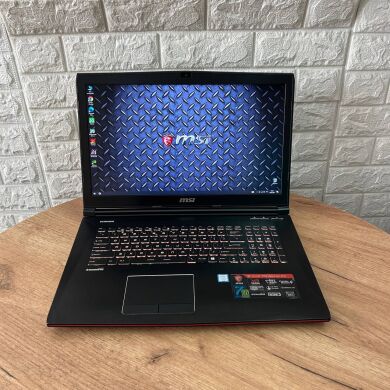 Игровой ноутбук MSI GE72MVR 7RG Apache Pro / 17.3" (1920x1080) IPS / Intel Core i7-7700HQ (4 (8) ядра по 2.8 - 3.8 GHz) / 16 GB DDR4 / 128 GB SSD + 1000 GB HDD / nVidia GeForce GTX 1070, 8 GB GDDR5, 256-bit / WebCam Игровой ноутбук MSI GE72MVR 7RG Apache Pro / 17.3" (1920x1080) IPS / Intel Core i7-7700HQ (4 (8) ядра по 2.8 - 3.8 GHz) / 16 GB DDR4 / 128 GB SSD + 1000 GB HDD / nVidia GeForce GTX 1070, 8 GB GDDR5, 256-bit / WebCam
