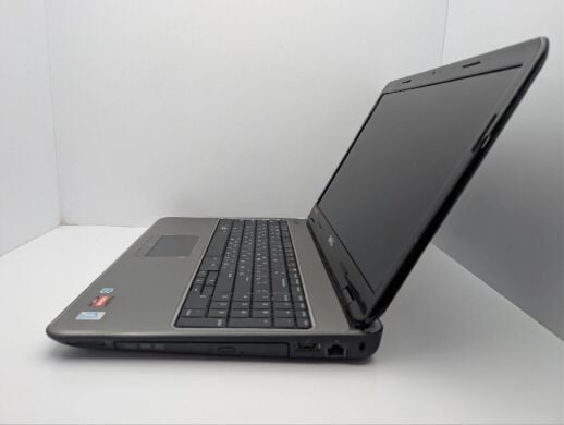 Ноутбук Dell Inspiron M5010 / 15.6" (1366x768) TN / AMD Athlon ll P360 (2 ядра по 2.3 - 3.2 GHz) / 6 GB DDR3 / 500 GB HDD / AMD Radeon HD 4650, 1 GB GDDR3, 128-bit / WebCam / DVD-ROM