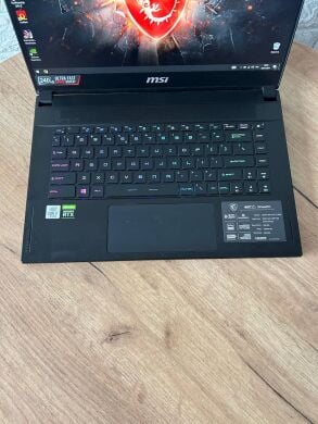 Ігровий ноутбук Б-клас MSI GS66 Stealth 10SF / 15.6" (1920x1080) IPS / Intel Core i7-10750H (6 (12) ядер по 2.6 - 5.0 GHz) / 16 GB DDR4 / 512 GB SSD / nVidia GeForce RTX 2070 Max-Q, 8 GB GDDR6, 256-bit / WebCam