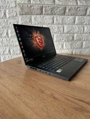 Ігровий ноутбук Б-клас MSI GS66 Stealth 10SF / 15.6" (1920x1080) IPS / Intel Core i7-10750H (6 (12) ядер по 2.6 - 5.0 GHz) / 16 GB DDR4 / 512 GB SSD / nVidia GeForce RTX 2070 Max-Q, 8 GB GDDR6, 256-bit / WebCam