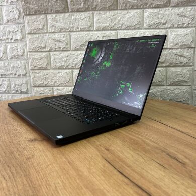 Ігровий ноутбук Б-клас Razer Blade 15 RZ09-0300 / 15.6" (1920x1080) IPS / Intel Core i7-9750H (6 (12) ядер по 2.6 - 4.5 GHz) / 16 GB DDR4 / 128 GB SSD M.2 + 1000 GB HDD / nVidia GeForce RTX 2060, 6 GB GDDR6, 192-bit / WebCam
