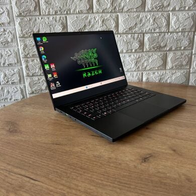 Ігровий ноутбук Б-клас Razer Blade 14 RZ09-0427 / 14" (2560x1440) IPS / AMD Ryzen 9 6900HX (8 (16) ядер по 3.3 - 4.9 GHz) / 16 GB DDR5 / 512 GB SSD NVMe / nVidia GeForce RTX 3070 Ti, 8 GB GDDR6, 256-bit / WebCam