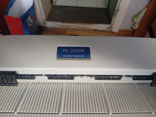 Принтер Б-класс Brother HL-2040R / Лазерная монохромная печать / 600x600 dpi / A4 / 20 стр/мин / USB 2.0, LPT