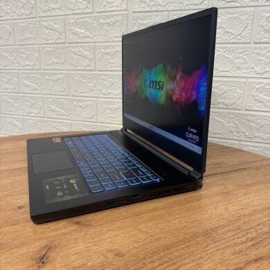 Игровой ноутбук Б-класс MSI Delta 15 A5EFK / 15.6" (1920x1080) IPS / AMD Ryzen 7 5800H (8 (16) ядер по 3.2 - 4.4 GHz) / 16 GB DDR4 / 1000 GB SSD / AMD Radeon RX 6700M, 10 GB GDDR6, 160-bit / WebCam
