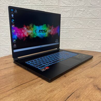 Игровой ноутбук Б-класс MSI Delta 15 A5EFK / 15.6" (1920x1080) IPS / AMD Ryzen 7 5800H (8 (16) ядер по 3.2 - 4.4 GHz) / 16 GB DDR4 / 1000 GB SSD / AMD Radeon RX 6700M, 10 GB GDDR6, 160-bit / WebCam