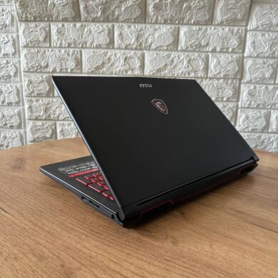Игровой ноутбук MSI GL62M 7REX / 15.6" (1920x1080) TN / Intel Core i7-7700HQ (4 (8) ядра по 2.8 - 3.8 GHz) / 8 GB DDR4 / 128 GB SSD M.2 + 1000 GB HDD / nVidia GeForce GTX 1050 Ti, 4 GB GDDR5, 128-bit / WebCam