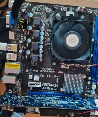 Комплект: Материнська плата AsRock A55M-HVS / AMD A4-3300 (2 ядра по 2.5 GHz) / FM1 / 4 GB DDR3 / AMD Radeon HD 6410D + Кулер