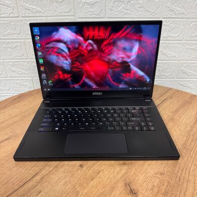 Игровой ноутбук MSI GS66 Stealth 10SF / 15.6" (1920x1080) IPS / Intel Core i7-10750H (6 (12) ядер по 2.6 - 5.0 GHz) / 16 GB DDR4 / 512 GB SSD / nVidia GeForce RTX 2070, 8 GB GDDR6, 256-bit / WebCam Игровой ноутбук MSI GS66 Stealth 10SF / 15.6" (1920x1080) IPS / Intel Core i7-10750H (6 (12) ядер по 2.6 - 5.0 GHz) / 16 GB DDR4 / 512 GB SSD / nVidia GeForce RTX 2070, 8 GB GDDR6, 256-bit / WebCam