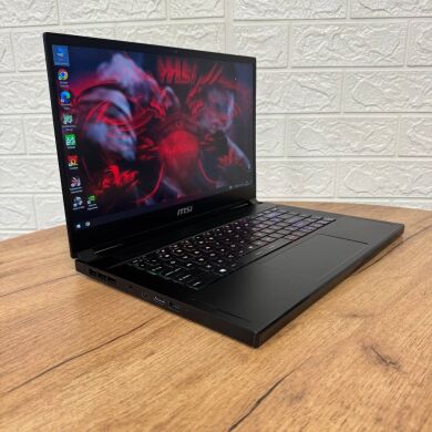 Игровой ноутбук MSI GS66 Stealth 10SF / 15.6" (1920x1080) IPS / Intel Core i7-10750H (6 (12) ядер по 2.6 - 5.0 GHz) / 16 GB DDR4 / 512 GB SSD / nVidia GeForce RTX 2070, 8 GB GDDR6, 256-bit / WebCam Игровой ноутбук MSI GS66 Stealth 10SF / 15.6" (1920x1080) IPS / Intel Core i7-10750H (6 (12) ядер по 2.6 - 5.0 GHz) / 16 GB DDR4 / 512 GB SSD / nVidia GeForce RTX 2070, 8 GB GDDR6, 256-bit / WebCam