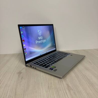 Ігровий ультрабук MSI Prestige 14 H B13UCX / 14" (1920x1200) IPS / Intel Core i9-13900H (14 (20) ядер по 2.6 - 5.4 GHz) / 32 GB DDR5 / 512 GB SSD NVMe / nVidia GeForce RTX 2050, 4 GB GDDR6, 64-bit / WebCam