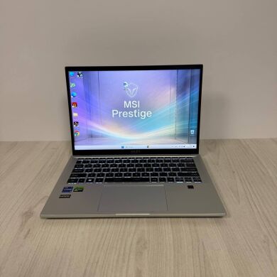 Ігровий ультрабук MSI Prestige 14 H B13UCX / 14" (1920x1200) IPS / Intel Core i9-13900H (14 (20) ядер по 2.6 - 5.4 GHz) / 32 GB DDR5 / 512 GB SSD NVMe / nVidia GeForce RTX 2050, 4 GB GDDR6, 64-bit / WebCam