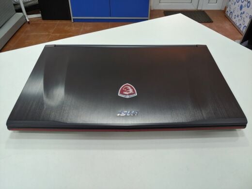 Ігровий ноутбук MSI GE62 6QF-254US / 15.6" (1920x1080) IPS LED / Intel Core i5-6300HQ (4 ядра по 2.3 - 3.2 GHz) / 16 GB DDR4 / 256 GB SSD+1 TB HDD / nVidia GeForce GTX 970M, 3 GB GDDR5, 256-bit / WebCam / DVD-RW / USB 3.0 / HDMI