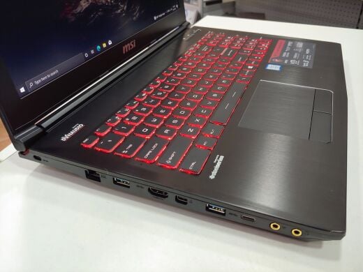 Ігровий ноутбук MSI GE62 6QF-254US / 15.6" (1920x1080) IPS LED / Intel Core i5-6300HQ (4 ядра по 2.3 - 3.2 GHz) / 16 GB DDR4 / 256 GB SSD+1 TB HDD / nVidia GeForce GTX 970M, 3 GB GDDR5, 256-bit / WebCam / DVD-RW / USB 3.0 / HDMI