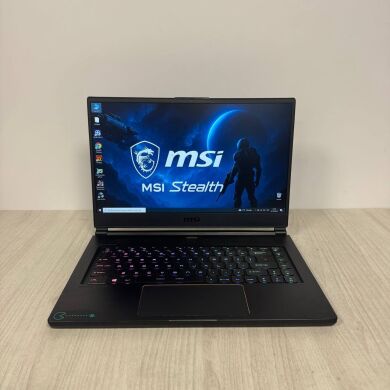 Игровой ноутбук Б-класс MSI GS65 Stealth 9SD / 15.6" (1920x1080) IPS / Intel Core i7-9750H (6 (12) ядра по 2.6 - 4.5 GHz) / 16 GB DDR4 / 512 GB SSD / nVidia GeForce GTX 1660 Ti, 6 GB GDDR6, 192-bit / WebCam
