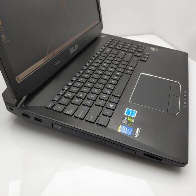 Ігровий ноутбук Asus ROG G750JZ / 17.3" (1920х1080) TN / Intel Core i7-4700HQ (4 (8) ядра по 2.4 - 3.4 GHz) / 16 GB DDR3 / 128 GB SSD+128 GB SSD / nVidia GeForce GTX 880M 4 GB / WebCam / DVD-ROM