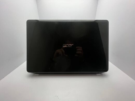 Ноутбук Acer Aspire E1-521 / 15.6" (1366x768) TN / AMD E2-1800 (2 ядра по 1.7 GHz) / 4 GB DDR3 / 320 GB HDD / AMD Radeon HD 7340 / WebCam