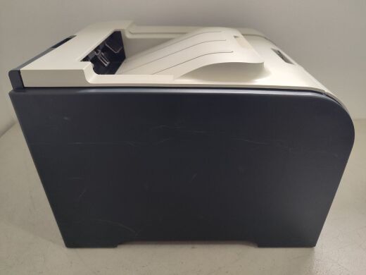 Принтер HP Color LaserJet CP2025 Printer / Лазерная цветная печать / 600x600 dpi / A4 / 20 стр/мин / USB 2.0, Ethernet / Дуплекс / Кабели в комплекте