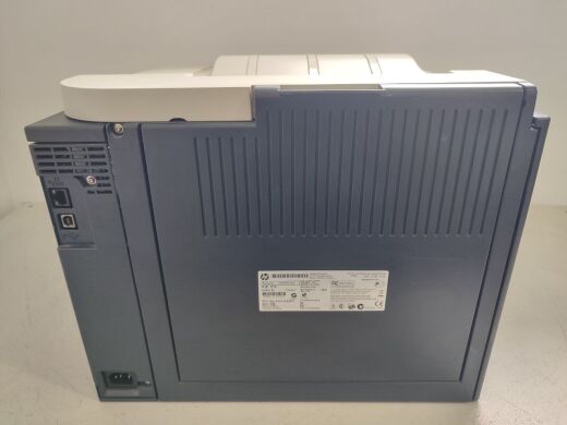 Принтер HP Color LaserJet CP2025 Printer / Лазерная цветная печать / 600x600 dpi / A4 / 20 стр/мин / USB 2.0, Ethernet / Дуплекс / Кабели в комплекте