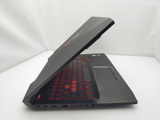 Игровой ноутбук HP OMEN 15-CE018DX / 15.6" (1920x1080) TN / Intel Core i7-7700HQ (4 (8) ядра по 2.8 - 3.8 GHz) / 8 GB DDR4 / 256 GB SSD + 1000 GB HDD / nVidia GeForce GTX 1050, 4 GB GDDR5, 128-bit / WebCam 