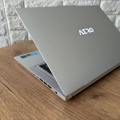 Игровой ноутбук Gigabyte Aero 16 XE5 / 16" (3840x2400) IPS / Intel Core i7-12700H (14 (20) ядер по 3.5 - 4.7 GHz) / 16 GB DDR5 / 1000 GB SSD / nVidia GeForce RTX 3070 Ti, 8 GB GDDR6, 256-bit / WebCam + USB-адаптер