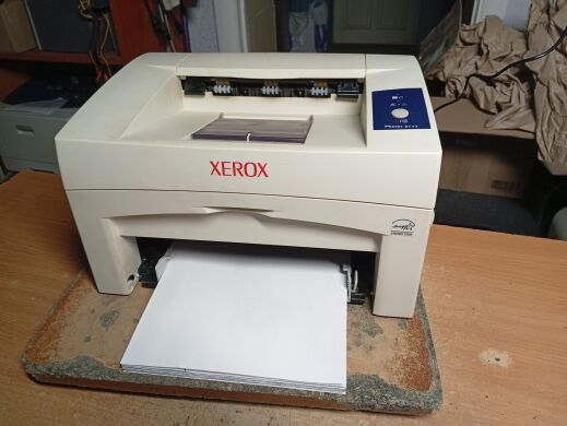 Принтер Б-класс Xerox Phaser 3117 / Лазерная монохромная печать / 600 x 600 dpi / A4 / 16 стр/мин / USB 2.0