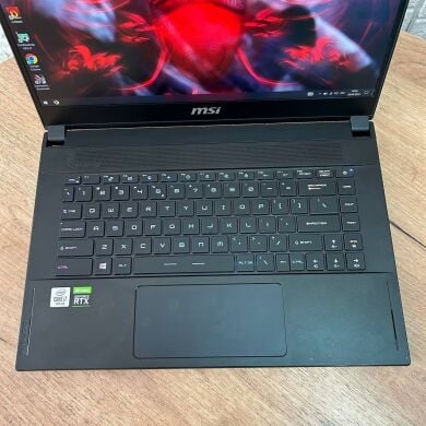 Игровой ноутбук MSI GS66 Stealth 10SE / 15.6" (1920x1080) IPS / Intel Core i7-10750H (6 (12) ядра по 2.6 - 5.0 GHz) / 16 GB DDR4 / 512 GB SSD / nVidia GeForce RTX 2060, 6 GB GDDR6, 192-bit / WebCam