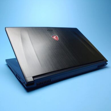 Ігровий ноутбук MSI GE72 2QE Apache / 17.3" (1920x1080) IPS / Intel Core i7-4720HQ (4 (8) ядра по 2.6 - 3.6 GHz) / 16 GB DDR3 / 1000 GB SSD / nVidia GeForce GTX 965M, 2 GB DDR5, 128-bit / WebCam / Win 10 Home