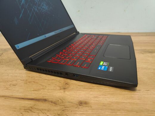 Ігровий ноутбук MSI GF63 Thin 11UC / 15.6" (1920x1080) IPS / Intel Core i5-11400H (6 (12) ядер по 2.7 - 4.5 GHz) / 16 GB DDR4 / 512 GB SSD / nVidia GeForce RTX 3050, 4 GB GDDR6, 128-bit / WebCam / Windows 111