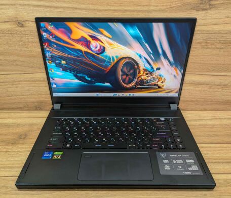 Ігровий ноутбук MSI Stealth GS 66 12UGS / 15.6" (1920x1080) IPS / Intel Core i7-12700H (14 (20) ядер по 3.5 - 4.7 GHz) / 16 GB DDR5 / 1000 GB SSD / nVidia GeForce RTX 3070 Ti, 8 GB GDDR6X, 256-bit / WebCam / Windows 11