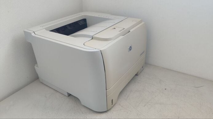 Принтер HP LaserJet P2035 / Лазерная монохромная печать / 600x600 dpi / A4 / 30 стр/мин / USB 2.0 / Кабели