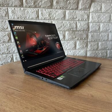 Игровой ноутбук Б-класс MSI GF65 Thin 10UE / 15.6" (1920x1080) IPS / Intel Core i5-10500H (6 (12) ядер по 2.5 - 4.5 GHz) / 16 GB DDR4 / 512 GB SSD / nVidia GeForce RTX 3060, 6 GB GDDR6, 192-bit / WebCam