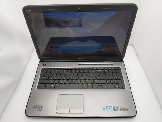 Ігровий ноутбук Dell XPS L702X Grey / 17.3" (1600x900) TN / Intel Core i7-2630QM (4 (8) ядер по 2.0 - 2.9 GHz) / 8 GB DDR3 / 240 GB SSD + 1000 GB HDD / nVidia GeForce GT 555M, 3 GB GDDR3, 128-bit / WebCam 