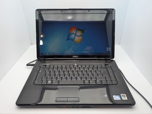 Ноутбук Dell Inspiron 1545 / 15.6" (1366x768) TN / Intel Pentium T4300 (2 ядра по 2.1 GHz) / 4 GB DDR2 / 250 GB HDD / Intel GMA 4500M Graphics / WebCam / DVD-ROM