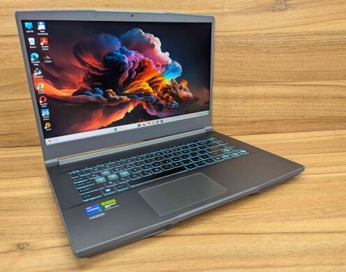 Игровой ноутбук MSI Thin 15 B12v6 / 15.6" (1920x1080) IPS / Intel Core i7-12650H (10 (16) ядер по 3.5 - 4.7 GHz) / 16 GB DDR4 / 512 GB SSD / nVidia GeForce RTX 4050, 6 GB GDDR6, 96-bit / WebCam / Windows 11