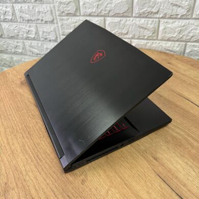Ігровий ноутбук MSI GF63 Thin 8RD / 15.6" (1920x1080) IPS / Intel Core i7-8750H (6 (12) ядер по 2.2 - 4.1 GHz) / 8 GB DDR4 / 256 GB SSD / nVidia GeForce GTX 1050 Ti MaxQ, 4 GB GDDR5, 128-bit / WebCam Ігровий ноутбук MSI GF63 Thin 8RD / 15.6" (1920x1080) IPS / Intel Core i7-8750H (6 (12) ядер по 2.2 - 4.1 GHz) / 8 GB DDR4 / 256 GB SSD / nVidia GeForce GTX 1050 Ti MaxQ, 4 GB GDDR5, 128-bit / WebCam