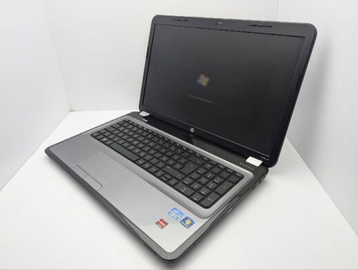 Ноутбук HP Pavillion G7 / 17.3" (1600x900) TN / Intel Core i5-2430M (2 (4) ядра по 2.4 - 3.0 GHz) / 6 GB DDR3 / 500 GB HDD / AMD Radeon HD 6450M, 1 GB GDDR3, 64-bit / WebCam / DVD-ROM