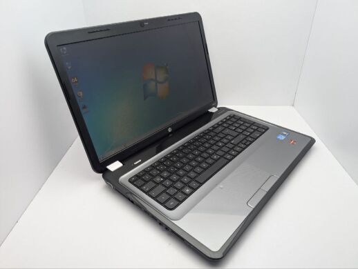 Ноутбук HP Pavillion G7 / 17.3" (1600x900) TN / Intel Core i5-2430M (2 (4) ядра по 2.4 - 3.0 GHz) / 6 GB DDR3 / 500 GB HDD / AMD Radeon HD 6450M, 1 GB GDDR3, 64-bit / WebCam / DVD-ROM