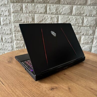 Игровой ноутбук MSI Raider GE65 9SF / 15.6" (1920x1080) IPS / Intel Core i7-9750H (6 (12) ядер по 2.6 - 4.5 GHz) / 16 GB DDR4 / 512 GB SSD / nVidia GeForce RTX 2070, 8 GB GDDR6, 256-bit / WebCam