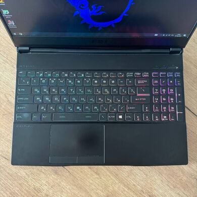 Игровой ноутбук MSI Raider GE65 9SF / 15.6" (1920x1080) IPS / Intel Core i7-9750H (6 (12) ядер по 2.6 - 4.5 GHz) / 16 GB DDR4 / 512 GB SSD / nVidia GeForce RTX 2070, 8 GB GDDR6, 256-bit / WebCam